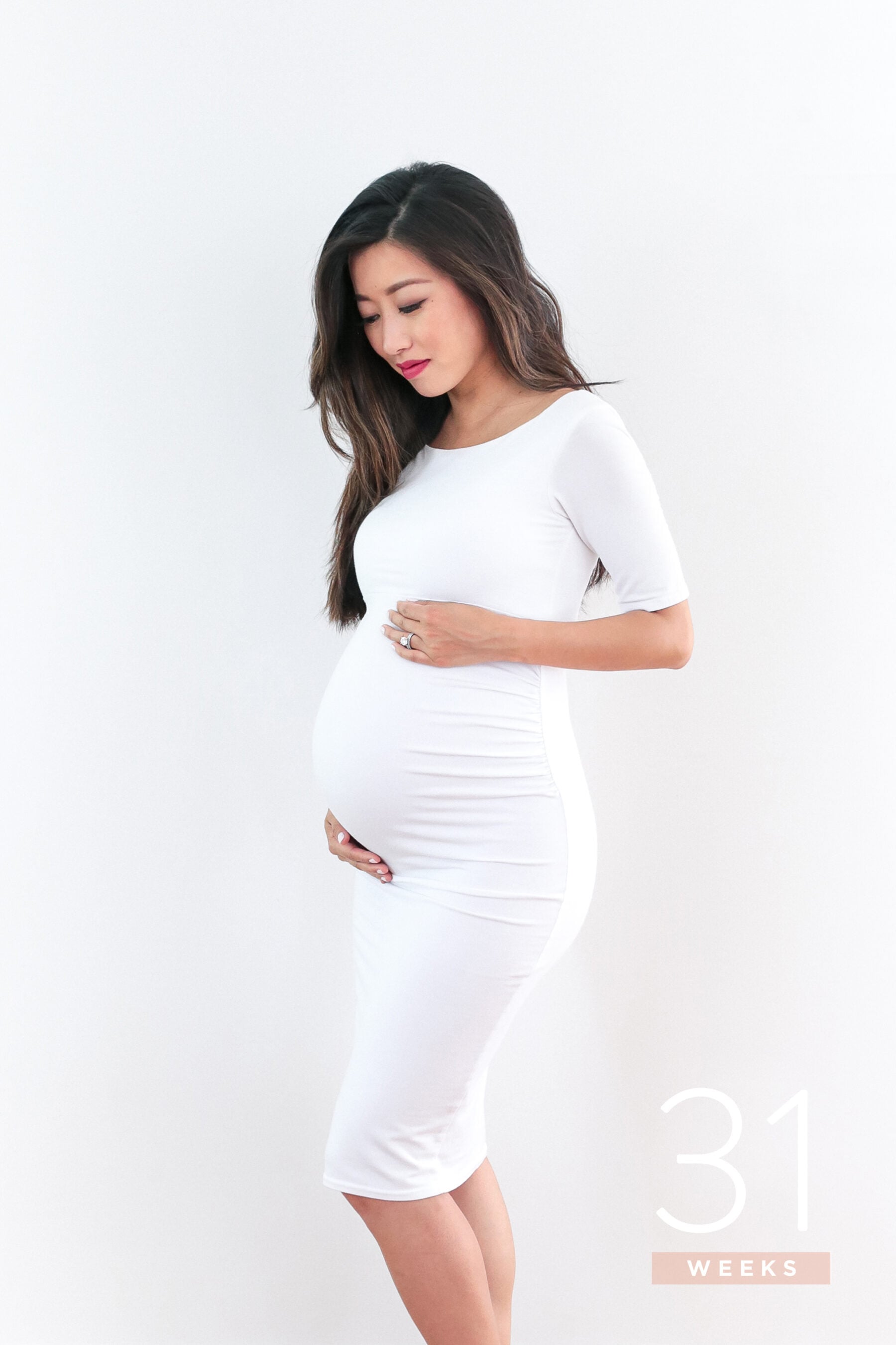 pregnant bump progress photos third trimester 31 weeks