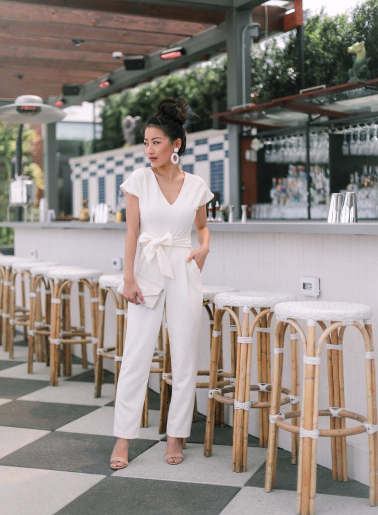 petite white jumpsuit outfit rehearsal dinner bridal shower outfit