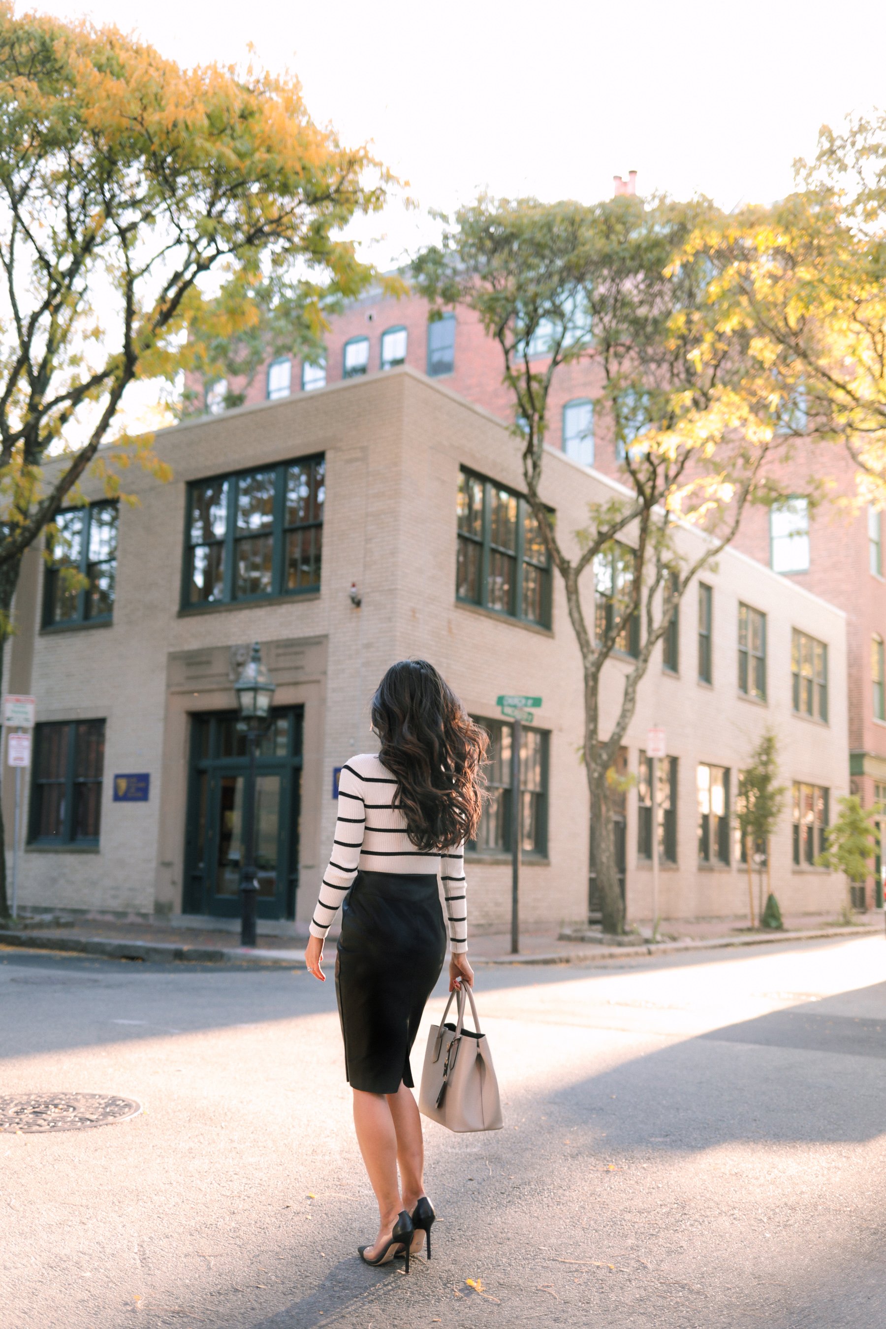 how to style a black leather skirt for work