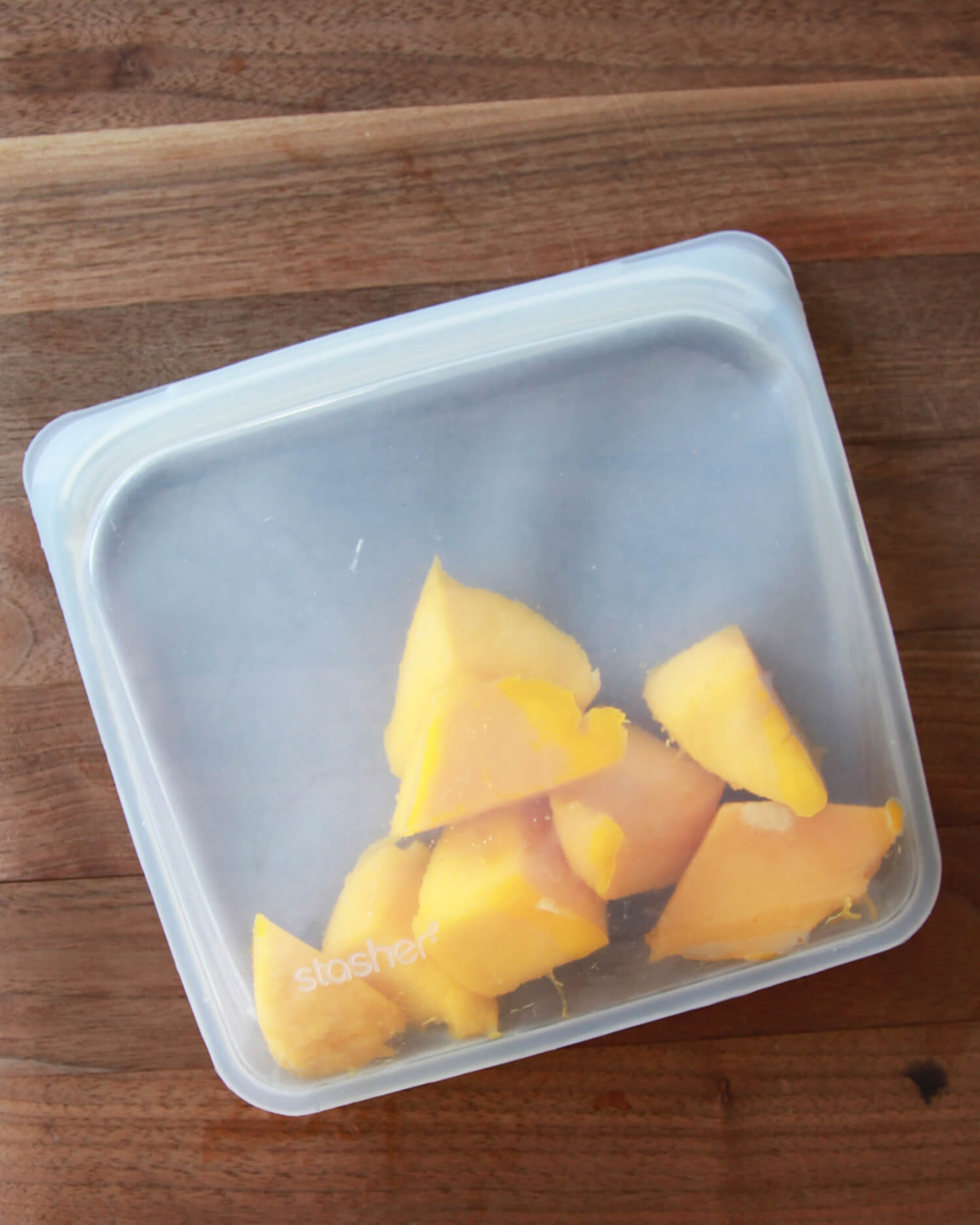 freeze ripe fruit pieces in a stasher bag