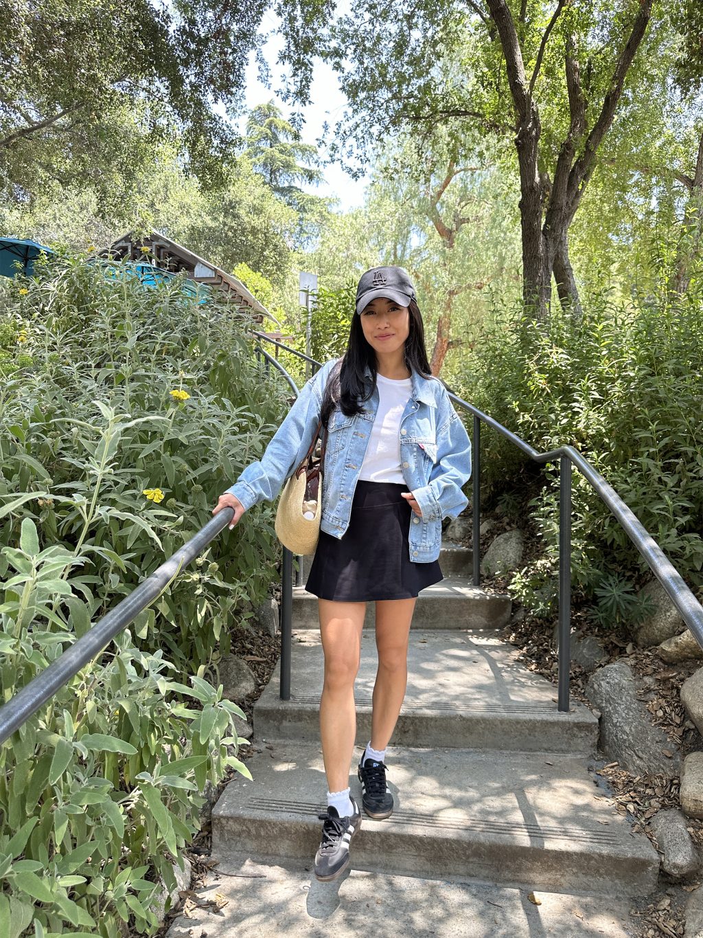 black skort denim jacket mom kid friendly travel outfit